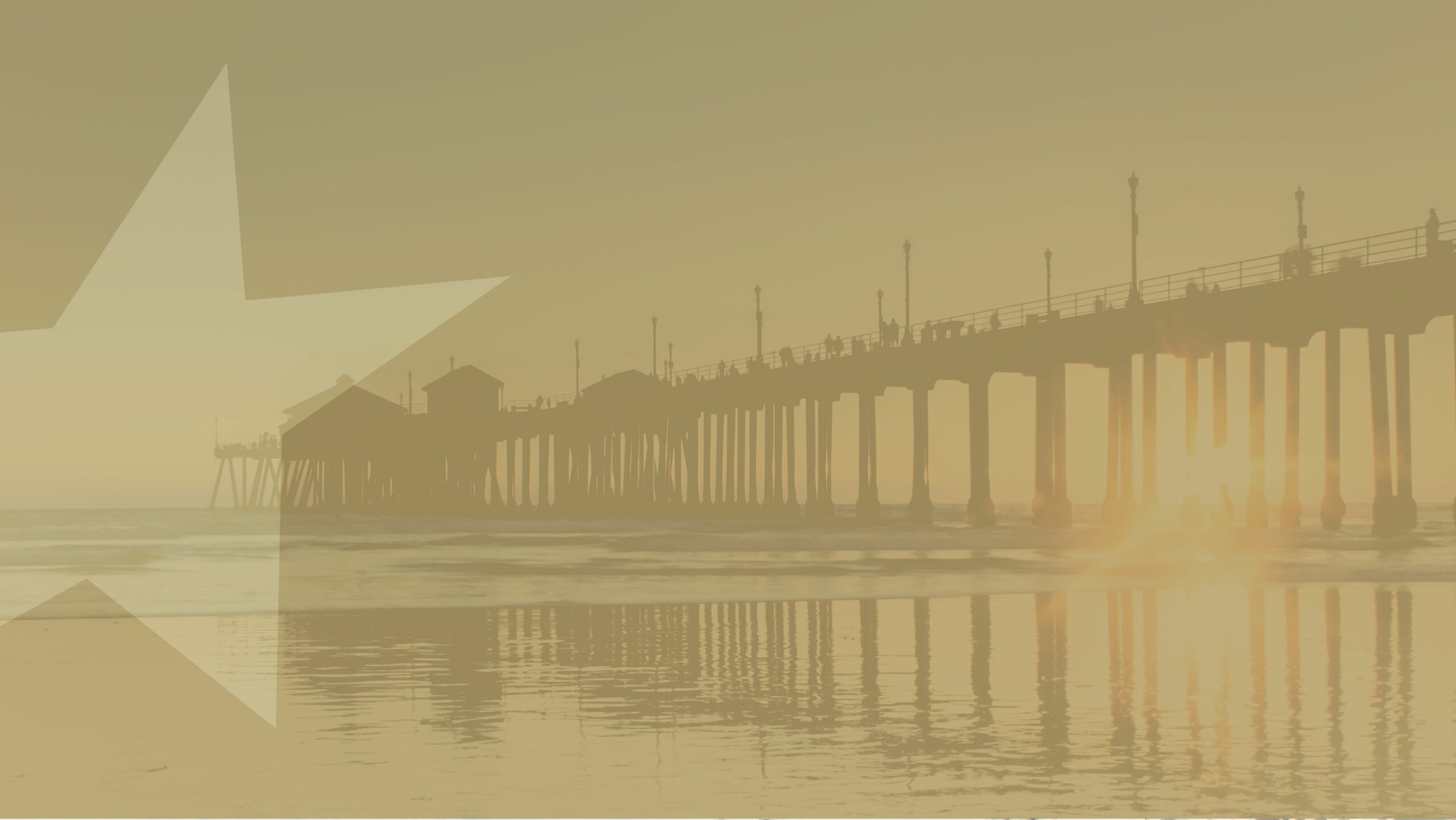 LocationHero_HuntingtonBeach_PhysicalTherapy Man with facial hair and red shirt smiling